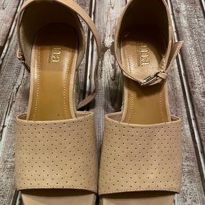 A.n.a size 8 pair of tan platform shoes.